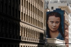 FILE - A mural on the side of a building depicting Swedish climate activist Greta Thunberg is shown in San Francisco, March 4, 2021.