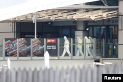 Forensic police search the Manchester Arena in Manchester, Britain, May 23, 2017.