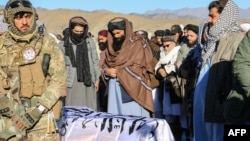 Sirajuddin Haqqani (C), the Taliban interior minister, attends the funeral ceremony of Khalil Ur-Rahman Haqqani, the Minister for Refugees and Repatriation, in Sarana of Paktia province, south of Kabul, Afghanistan, Dec. 12, 2024.