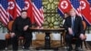 FILE - U.S. President Donald Trump, right, and North Korea's leader Kim Jong Un meet during the second U.S.-North Korea summit at the Sofitel Legend Metropole hotel in Hanoi, Vietnam, Feb. 28, 2019.