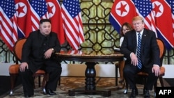 FILE - U.S. President Donald Trump, right, and North Korea's leader Kim Jong Un meet during the second U.S.-North Korea summit at the Sofitel Legend Metropole hotel in Hanoi, Vietnam, Feb. 28, 2019.