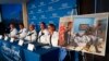 A photo of an unidentified patient whose lungs were irreparably damaged from vaping is displayed while medical staff at Henry Ford Hospital answer questions during a news conference in Detroit, Nov. 12, 2019. 