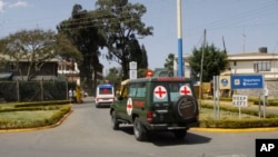 FILE - Bodies of Kenyan soldiers killed in Somalia are transported by ambulances in Nairobi, Kenya, Jan 27, 2017. Seven Kenyan soldiers were killed Sunday by an IED blast in Somalia's Lower Jubba region.