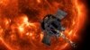 FILE - This image made available by NASA shows an artist's rendering of the Parker Solar Probe approaching the sun. NASA said on Friday that the probe was operating normally after completing the closest-ever approach to the sun by any human-made object. 
