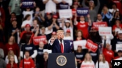 FILE - President Donald Trump speaks during a campaign rally in Hershey, Pennsylvania, Dec. 10, 2019.