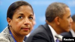FILE - U.S. National Security Advisor Susan Rice is seen with President Barack Obama in the background.