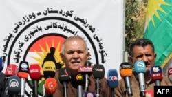 Le général Wasta Rasul, à gauche, commandant des forces Pehsmergas dans le sud de Kirkuk, en Irak, le 30 juin 2017.