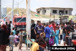 Families continue to flee their homes, lacking basic services and still facing security crises at the Hassan Sham camp in Iraq, May 10, 2018.