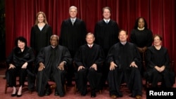 FILE - U.S. Supreme Court justices pose for their group portrait at the Supreme Court in Washington, Oct. 7, 2022.