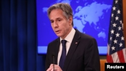 Menteri Luar Negeri AS Antony Blinken berbicara kepada awak media dalam konferensi pers di kantor Kementerian Luar Negeri di Washington, pada 21 Desember 2021. (Foto: Reuters/Evelyn Hockstein)