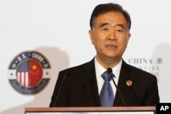 Chinese Vice Premier Wang Yang speaks at the opening of the U.S.-China Comprehensive Economic Dialogue at the Treasury Department in Washington, July 19, 2017.