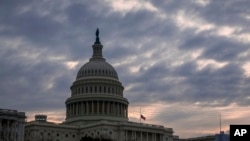 The Capitol is seen in Washington, Friday morning, Dec. 14, 2018, after Congress adjourned until next week. Congress is racing to avoid a partial government shutdown over President Donald Trump’s border. 