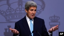 U.S. Secretary of State John Kerry answers a question during a joint news conference with Spain's Foreign Minister Jose Manuel Garcia Margallo at the Santa Cruz palace, Spain's Foreign Affairs Ministry, in Madrid, Spain, Monday, Oct. 19, 2015.