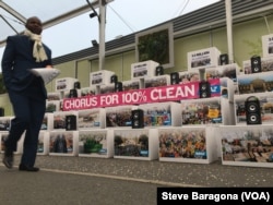 Voice mails from around the world left for negotiators at the Paris climate talks play at a display by the international environmental group Avaaz, Dec. 10, 2015.