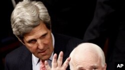 Sen. John McCain, R-Ariz., right, and Sen. John Kerry, D-Mass. are seen on Capitol Hill in Washington, Tuesday, Jan. 25, 2011, prior to the start of President Barack Obama's State of the Union address.