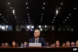 Supreme Court Justice nominee Neil Gorsuch arrives for his confirmation hearing before the Senate Judiciary Committee on Capitol Hill in Washington, March 20, 2017.
