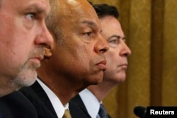 FILE - U.S. National Counterterrorism Center Director Nicholas Rasmussen, Homeland Security Secretary Jeh Johnson and FBI Director James Comey (L-R) testify before a House Homeland Security Committee hearing on Capitol Hill in Washington, July 14, 2016.