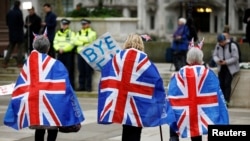 People celebrate Britain leaving the EU on Brexit day at Parliament Square in London, Britain, Jan. 31, 2020. 