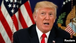 FILE - U.S. President Donald Trump speaks to reporters after a security briefing at his golf estate in Bedminster, New Jersey, Aug. 10, 2017.