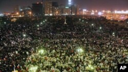 Pro-government supporters rally in Bahrain following a week of opposition protests