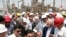 FILE - In this photo released by the office of the Iranian president on April 30, 2017, then-President Hassan Rouhani, center, inaugurates a new refinery in Bandar Abbas, Iran. Global oil prices might hinge on Israel's military response to Iran's Oct. 1, 2024, missile attacks.