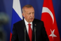 FILE - Turkish President Recep Tayyip Erdogan attends a news conference in Moscow, Russia, Aug. 27, 2019.