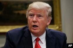 President Donald Trump speaks during a meeting with county sheriffs in the Roosevelt Room of the White House in Washington, Feb. 7, 2017.