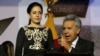 Ecuador's President Lenin Moreno gives a speech, as his wife Rocio Gonzalez listens to him, from the government palace balcony in Quito, Ecuador, May 24, 2017.
