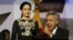 Ecuador's President Lenin Moreno gives a speech, as his wife Rocio Gonzalez listens to him, from the government palace balcony in Quito, Ecuador, May 24, 2017.