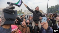 দামেস্কের কেন্দ্রস্থলে জনগণের উল্লাস। ফটোঃ ৮ ডিসেম্বর, ২০২৪।