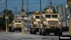 Kenyan police forces patrol a neighborhood in Port-au-Prince, Haiti, Sept. 4, 2024. 