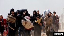 'Yan gudun hijirar Siriya da ke barin Ghouta