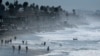 FILE - People cool off at the beach during a Southern California heat wave in Oceanside, California, Oct. 24, 2017. 