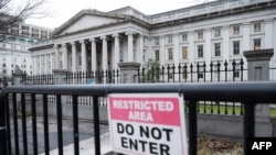 FILE - The U.S. Treasury Department building is seen in Washington, Jan. 19, 2023. The department said on Dec. 30, 2024, that a China state-sponsored actor was behind a cyber breach resulting in access to some of its workstations.