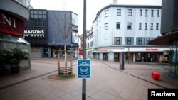 Picture shows the abandoned main shopping area due to the coronavirus disease (COVID-19) pandemic lockdown in downtown Essen, Germany, March 11, 2021. Picture taken on March 11, 2021. REUTERS/Wolfgang Rattay