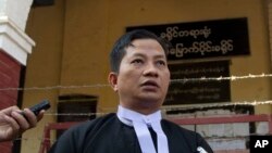 Than Zaw Aung, lawyer for Reuters journalists Wa Lone and Kyaw Soe Oo, talks to journalists after their trial, Feb. 1, 2018, outside Yangon, Myanmar. 