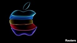 FILE PHOTO: CEO Tim Cook speaks at an Apple event at their headquarters in Cupertino, California, U.S. September 10, 2019. REUTERS/Stephen Lam/File Photo