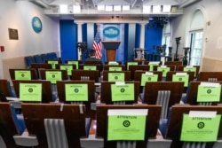 The White House's Brady press briefing room is almost empty in Washington, Oct. 2, 2020.