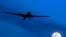 FILE - A U.S. Predator drone is shown above Kandahar Air Field, southern Afghanistan, Jan. 31, 2010. 