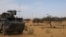 FILE - A light armored vehicle of the French counterterrorism Barkhane force in Africa's Sahel region is seen near the town of Gossi, central Mali, March 25, 2019.