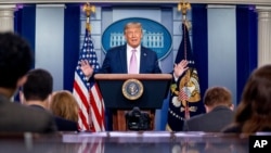 President Donald Trump speaks at a news conference in the James Brady Press Briefing Room at the White House, Aug. 11, 2020, in Washington. 