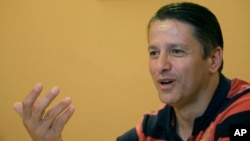 FILE - Former Bosnian Army commander of Srebrenica, Naser Oric, talks to the AP in Sarajevo, Bosnia, June 1, 2011.