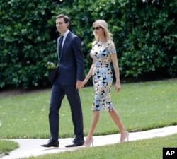 Ivanka Trump, daughter and assistant to President Donald Trump, and her husband White House senior adviser Jared Kushner, walk out to join President Trump aboard Marine One helicopter, May 19, 2017.