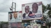 FILE - The campaign billboards of Ghana's two main political parties running in this year's national election are shown in the streets of Accra in Ghana, Oct. 8, 2016.
