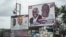 FILE - The campaign billboards of Ghana's two main political parties running in this year's national election are shown in the streets of Accra in Ghana, Oct. 8, 2016.