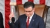 US Speaker of the House Mike Johnson, Republican from Louisiana, holds up the gavel after he won the vote for Speaker of the House, during the first day of the 119th Congress in the House Chamber at the US Capitol in Washington, DC, on January 3, 2025. (