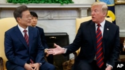 President Donald Trump meets with South Korean President Moon Jae-In in the Oval Office of the White House, May 22, 2018, in Washington. 