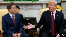 President Donald Trump meets with South Korean President Moon Jae-In in the Oval Office of the White House, May 22, 2018, in Washington. 
