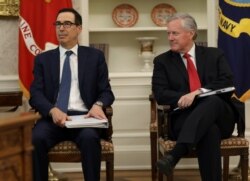 Treasury Secretary Mnuchin and White House Chief of Staff Meadows attend meeting to discuss coronavirus aid legislation at the White House in Washington.