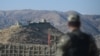 FILE - A Pakistani army soldier stands guard at a border post in Ghulam Khan, North Waziristan, on the border between Pakistan and Afghanistan, Jan. 27, 2019.